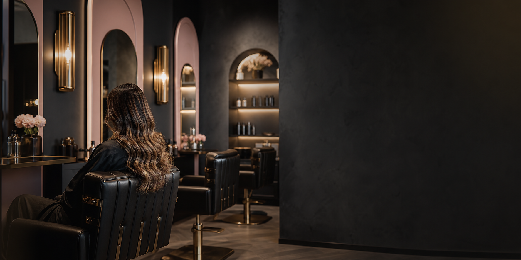 Salon interior, chairs and mirrors along a tiled wall